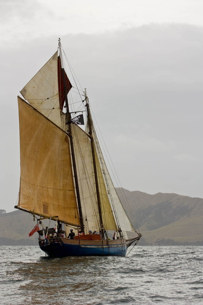 Salvo fired The 'Lily' shows a clean pair of heels as she makes for cover in the Bay of islands - Tall Ships and Classic Invitation Regatta Russell boating Club photo copyright Paul Gilbert-AquaPx http://www.aquapx.com taken at  and featuring the  class