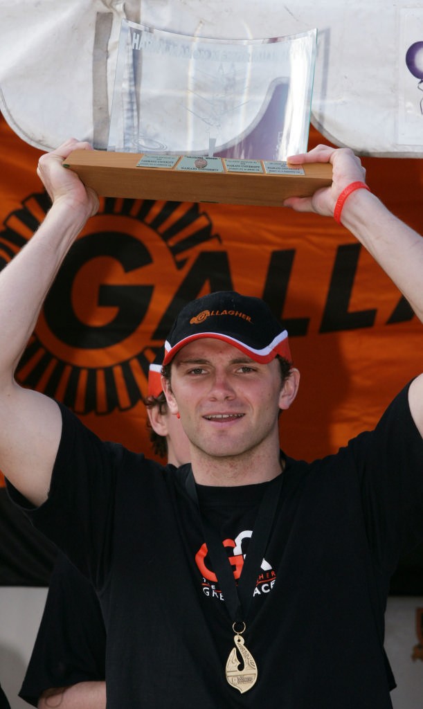 <b>Waikato captain Andrew McCowan with the Harry Mahon Trophy after the Gallagher Great Race, eights rowing on the Waikato River between the University of Waikato and Cambridge University from the UK, </b> © Stephen Barker