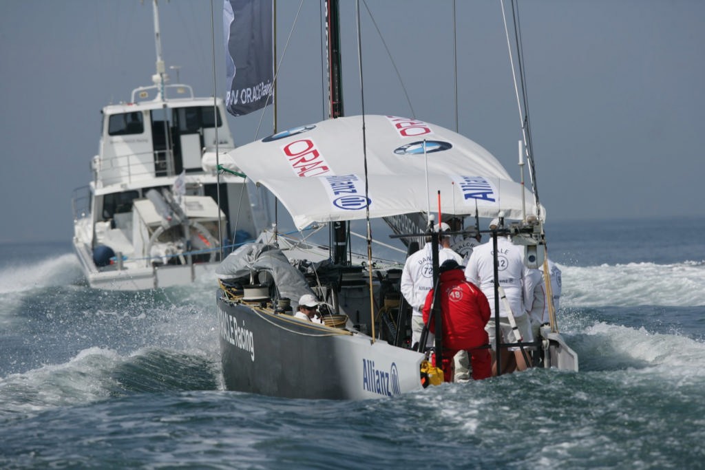 BMW Oracle tow out, or is it tow-back on a third windless day in Valencia in the Louis  Vuitton Cup. © BMW Oracle Racing Photo Gilles Martin-Raget http://www.bmworacleracing.com