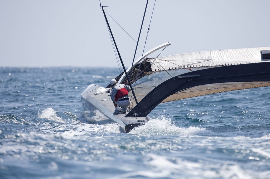 BMW ORACLE Racing - 90 ft Trimaran testing - doing some adjustment © BMW Oracle Racing Photo Gilles Martin-Raget http://www.bmworacleracing.com