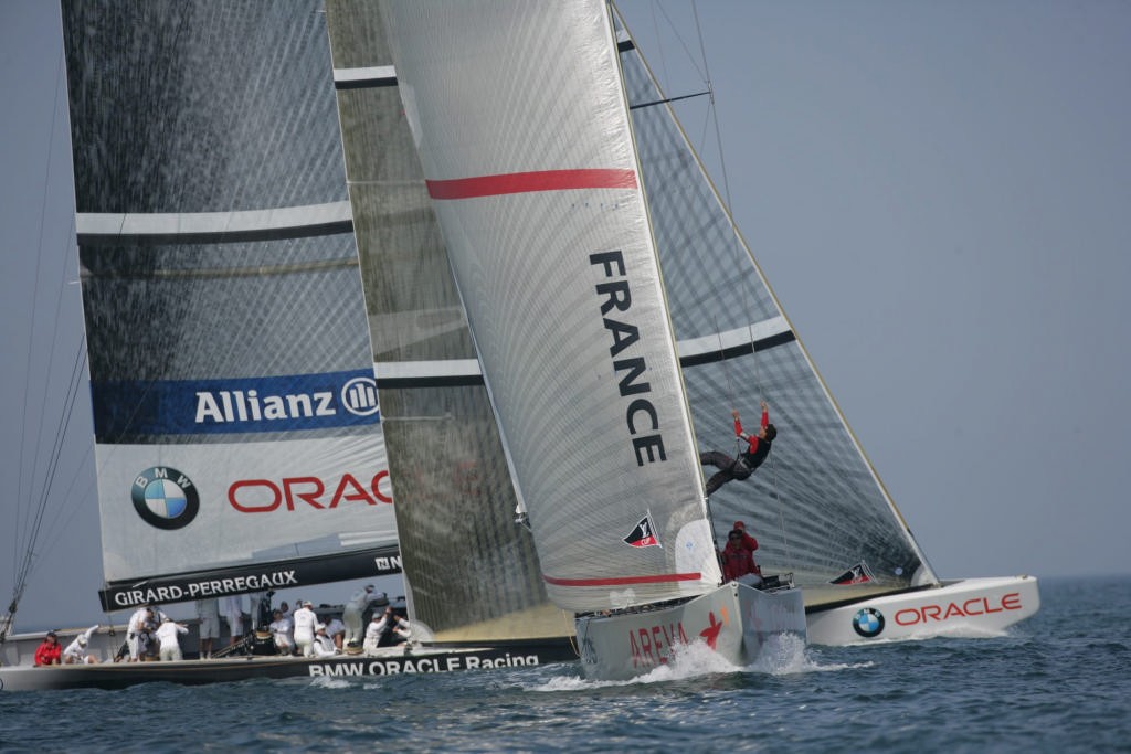 BMW Oracle and Areva go through the pre-race warmup before racing was cancelled for the fourth succesive day at Valencia photo copyright BMW Oracle Racing Photo Gilles Martin-Raget http://www.bmworacleracing.com taken at  and featuring the  class