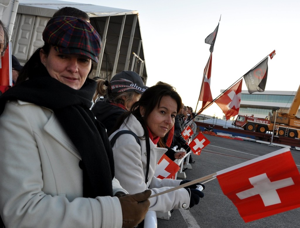 Swiss supporters waving flags. photo copyright Jean Philippe Jobé taken at  and featuring the  class