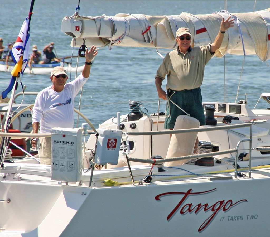 Phillip Rowe (r) acknowledges 70th birthday salute. Buddy Mike Abraham is already 70 - Transpac 2007 © Rich Roberts http://www.UnderTheSunPhotos.com