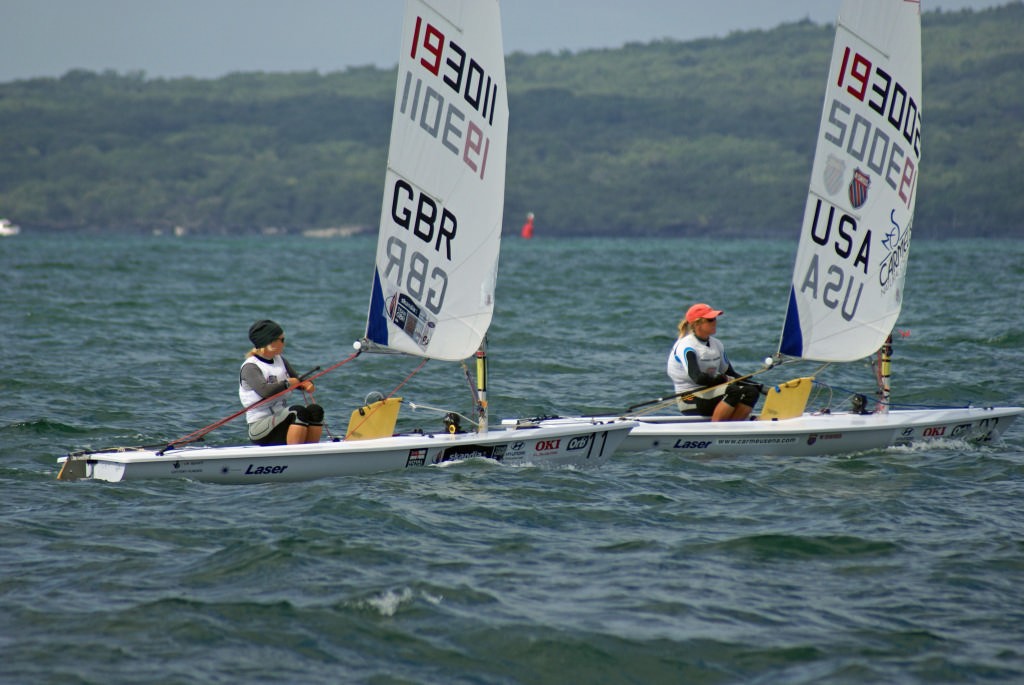 Race winner, Anna Tunnicliffe (USA) is chased by Penny Clark (GBR) in Race 8 photo copyright Richard Gladwell www.photosport.co.nz taken at  and featuring the  class