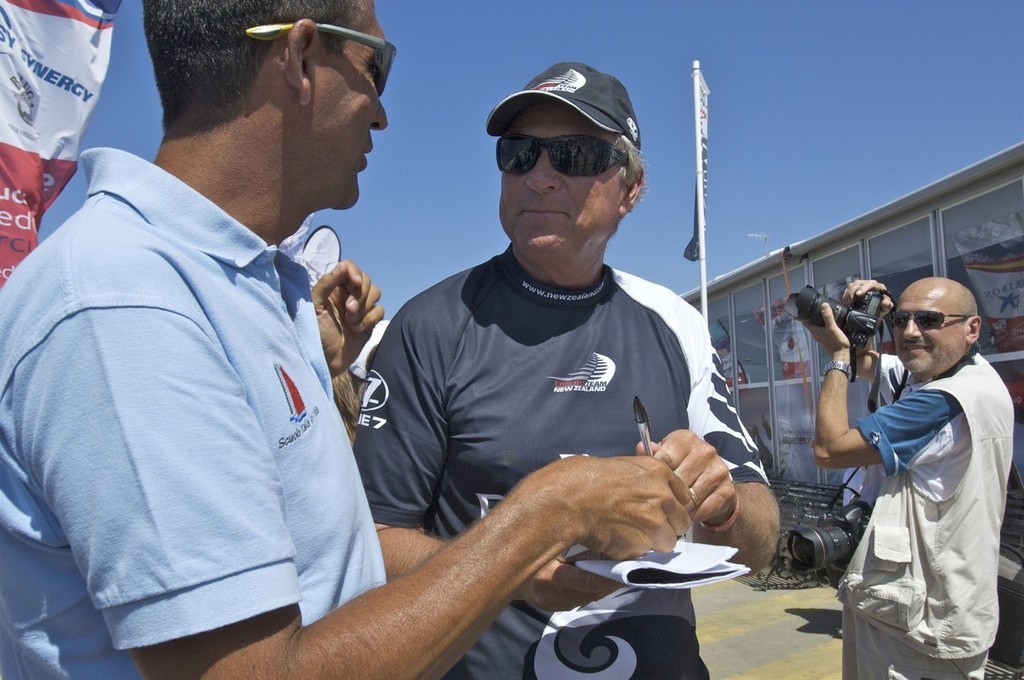 Emirates Team New Zealand coach, Rod Davis gives an autograph to a local fan before racing on day one, Sardinia Trophy, Audi MedCup 21/7/2009 © Emirates Team New Zealand / Photo Chris Cameron ETNZ 