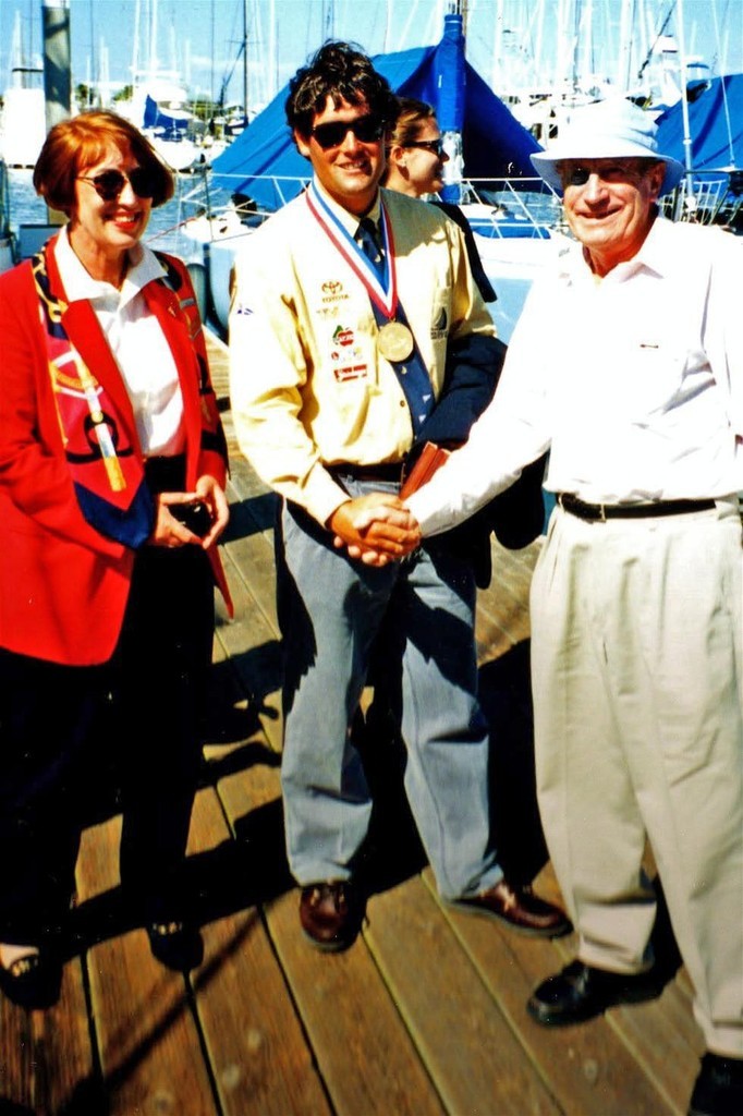 Hugh Poole and daughter congratulate Russell Coutts on his Gold medal win in the Finn class in 1984 photo copyright SW taken at  and featuring the  class