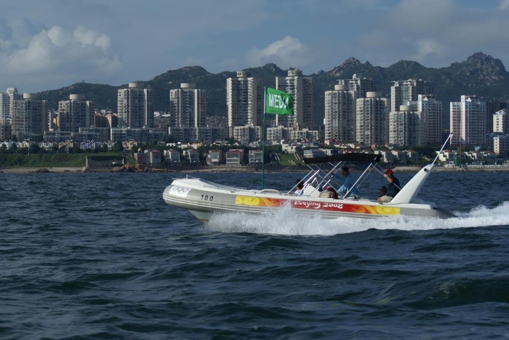 Media boat off Eastern Qingdao on a clear day © Richard Gladwell www.photosport.co.nz