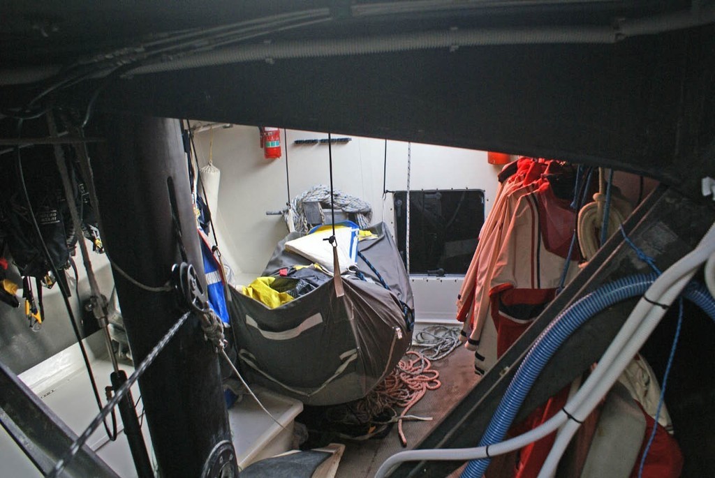 Three of the guests get to work in the sewer during spinnaker drops. © Richard Gladwell www.photosport.co.nz