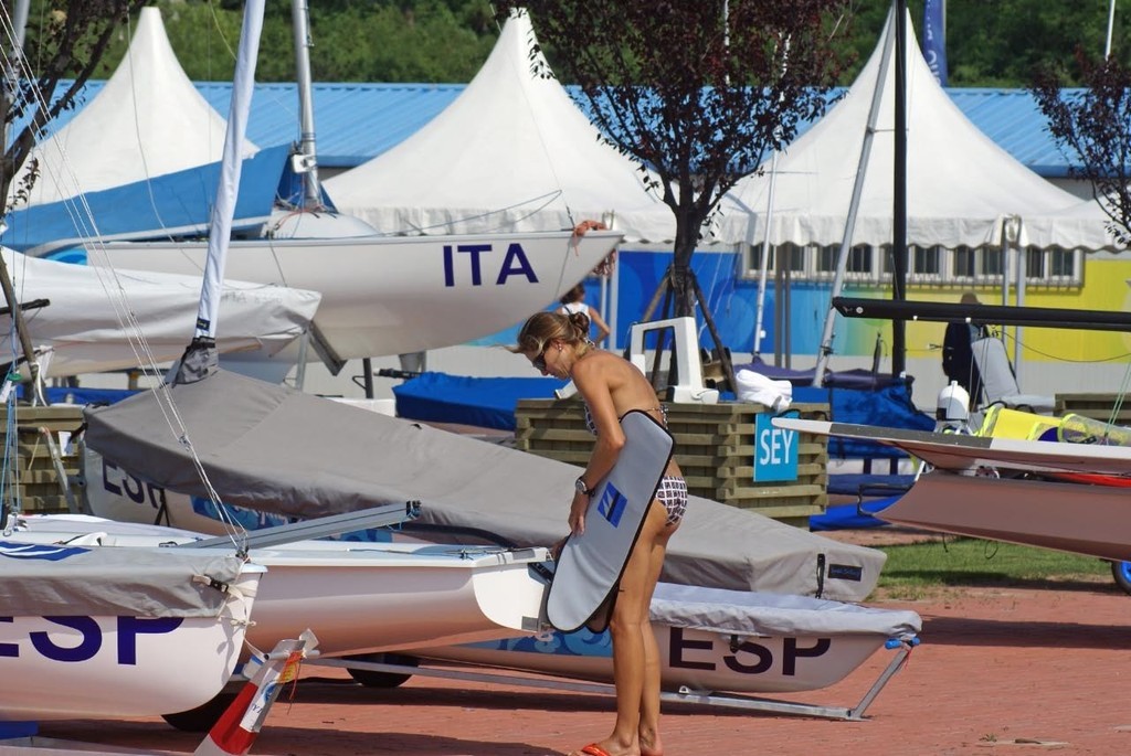 A Laser Radial sailor washing down after a training session today. © Richard Gladwell www.photosport.co.nz