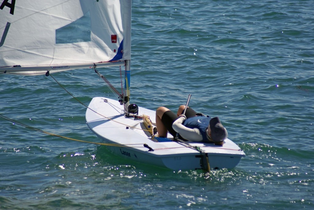 Paige Railey administers some self-therapy after her penalty on Day 3 - Womens Laser Radial Worlds © Richard Gladwell www.photosport.co.nz