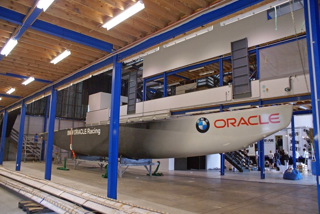 BMW Oracle Racing in the shed in Auckland, as the old logos come off in preparation for repainting © Richard Gladwell www.photosport.co.nz