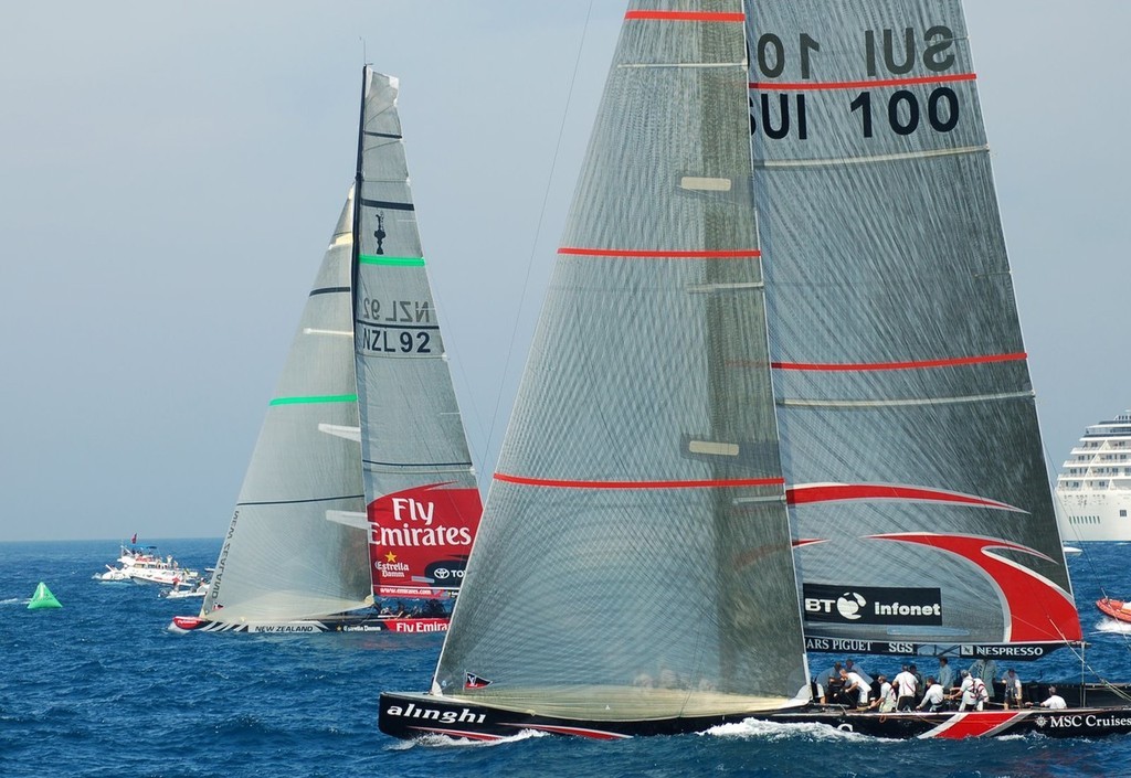 The coup de grace in the 32nd America’s Cup  as SUI-100 edges through a near-stalled NZL-92 on the finish line. The finish line is biased towards Alinghi. - photo © Valenciasailing.com <a target=