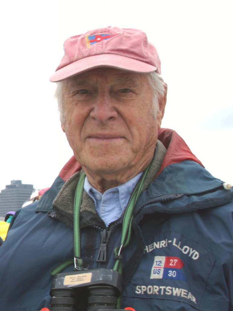 The late Edward du Moulin, seen here at the start of the Transatlantic Race in New York Harbor, who is a Past Commodore of the Knickerbocker YC and the founder of the Knickerbocker Cup. photo copyright Andrea Watson www.sailingpress.com taken at  and featuring the  class