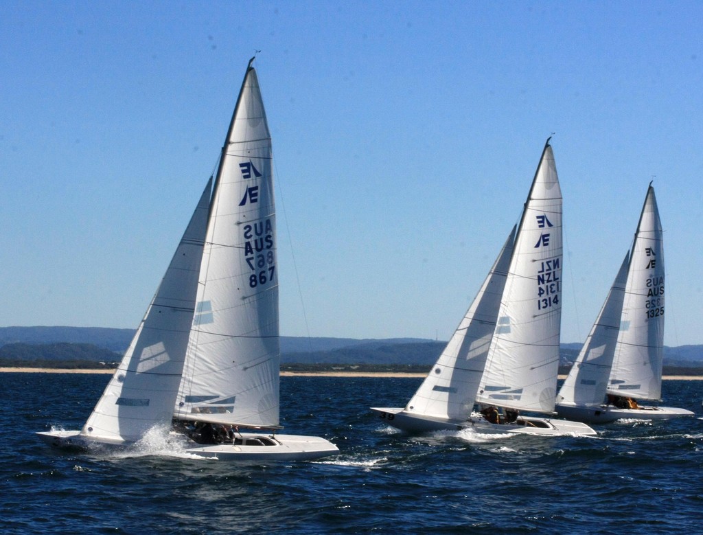 Fantazia (Tom Braidwood) ahead of Addiction (Lindsay Kennedy) and Absolute Pearler (Peter McNeill. 2010 Musto Etchells Australasian Winter Championship photo copyright 2010 Musto Etchells Australasian Winter Championship taken at  and featuring the  class