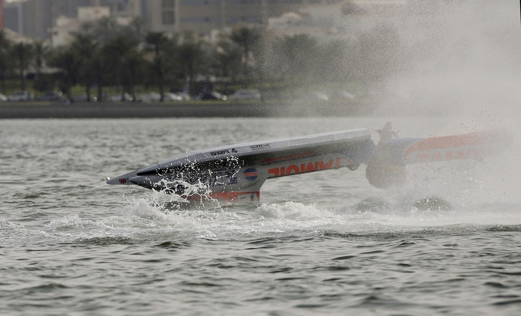 STAN KOURTSENOVSKY BARREL ROLL-Stan Kourtsenovsky of Russia in the Tamoil Team F1 powerboat crashes out of the 2nd time trials for the UIM F1 Powerboat Gerand Prix of Qatar in Doha Bay, Doha. Picture by Paul Lakatos/Idea Marketing. - 5th Annual Grand Prix of Qatar photo copyright F1 World Championship http://www.f1boat.com taken at  and featuring the  class
