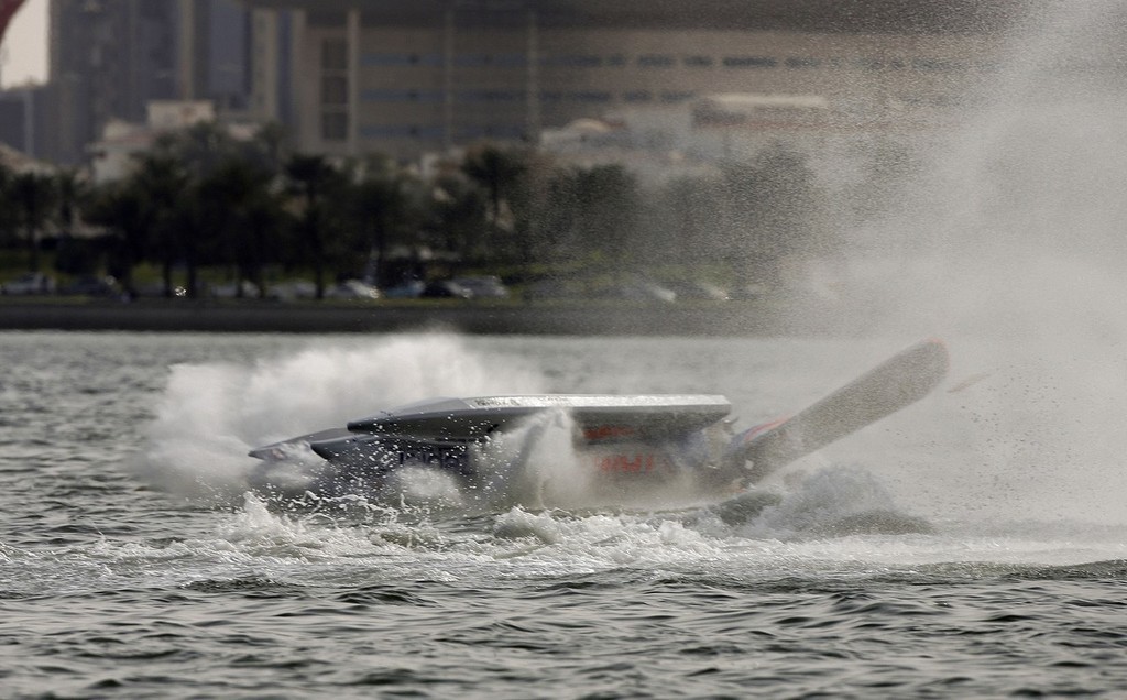 STAN KOURTSENOVSKY BARREL ROLL-Stan Kourtsenovsky of Russia in the Tamoil Team F1 powerboat crashes out of the 2nd time trials for the UIM F1 Powerboat Gerand Prix of Qatar in Doha Bay, Doha. Picture by Paul Lakatos/Idea Marketing. - 5th Annual Grand Prix of Qatar  © F1 World Championship http://www.f1boat.com