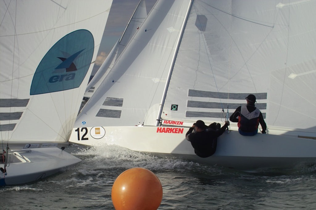 #12 NZL, Hamish Pepper and Carl Williams, fifth boat across the line in Race Five of the Star Worlds. © Chuck Lantz http://www.ChuckLantz.com