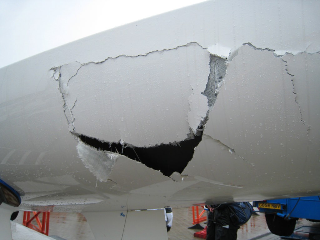 2007 Etchells World Championship, hosted by the Royal Corinthian Yacht Club, Cowes.  Damage to GBR1352 Arbitrator, sustained during the prestart sequence of the practise race. © Fiona Brown http://www.fionabrown.com