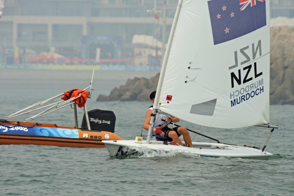Andrew Murdoch (NZL) heads for the windward mark, having got on the edge of a new breeze out of the Olympic marina- 2008 Olympics Qingdao - Medal Race - Laser © Richard Gladwell www.photosport.co.nz