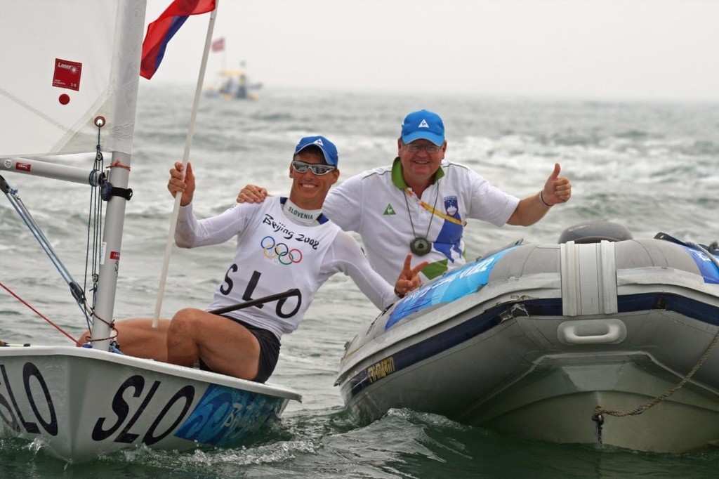 Vasilij Zbogar (SLO) and coach winner of the Silver Medal Mens Laser class 2008 Olympics © Richard Gladwell www.photosport.co.nz