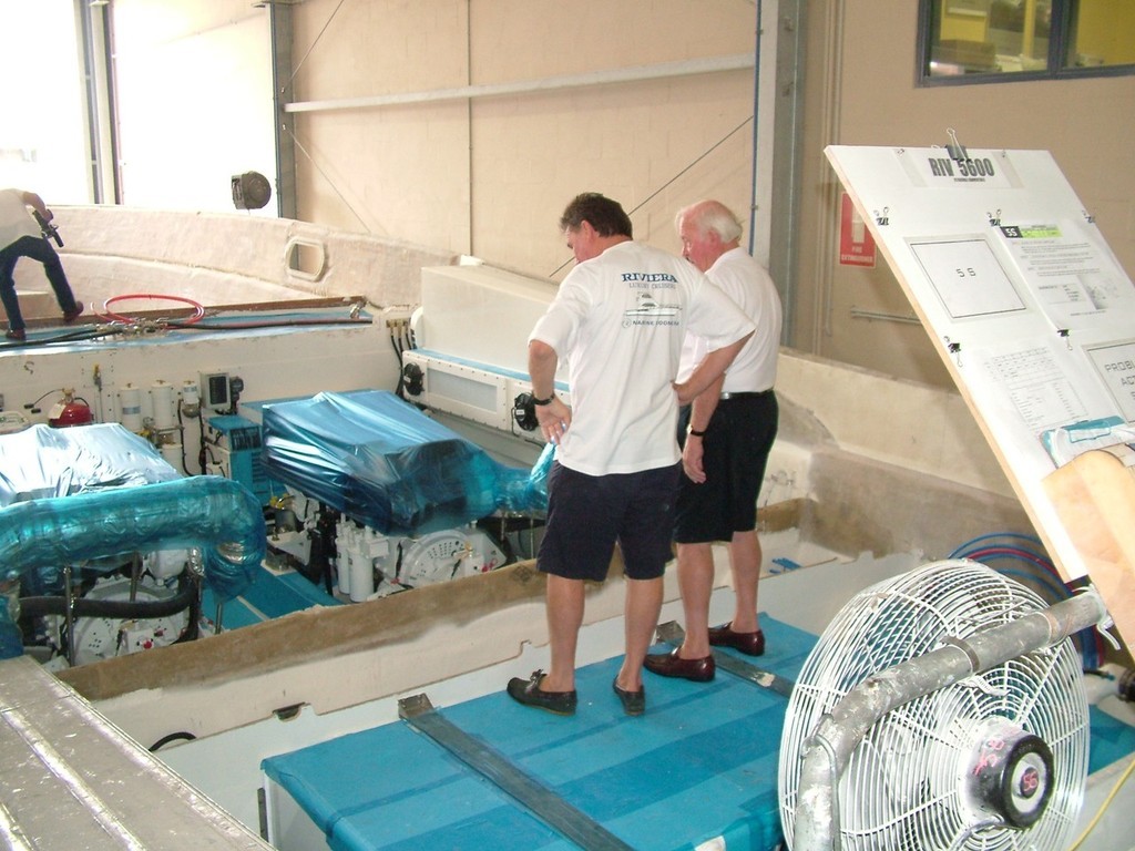 Standing on the 1,800-litre aft fuel tank, Ian Reynolds discusses build progress with R Marine Coomera Dealer Principal Keith Hanson. photo copyright Riviera . http://www.riviera.com.au taken at  and featuring the  class
