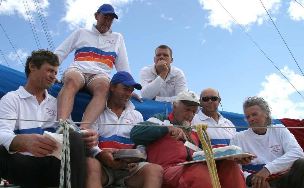 John Walker cuts the cake for his crew - Rolex Sydney Hobart Yacht Race 2008 © Crosbie Lorimer http://www.crosbielorimer.com