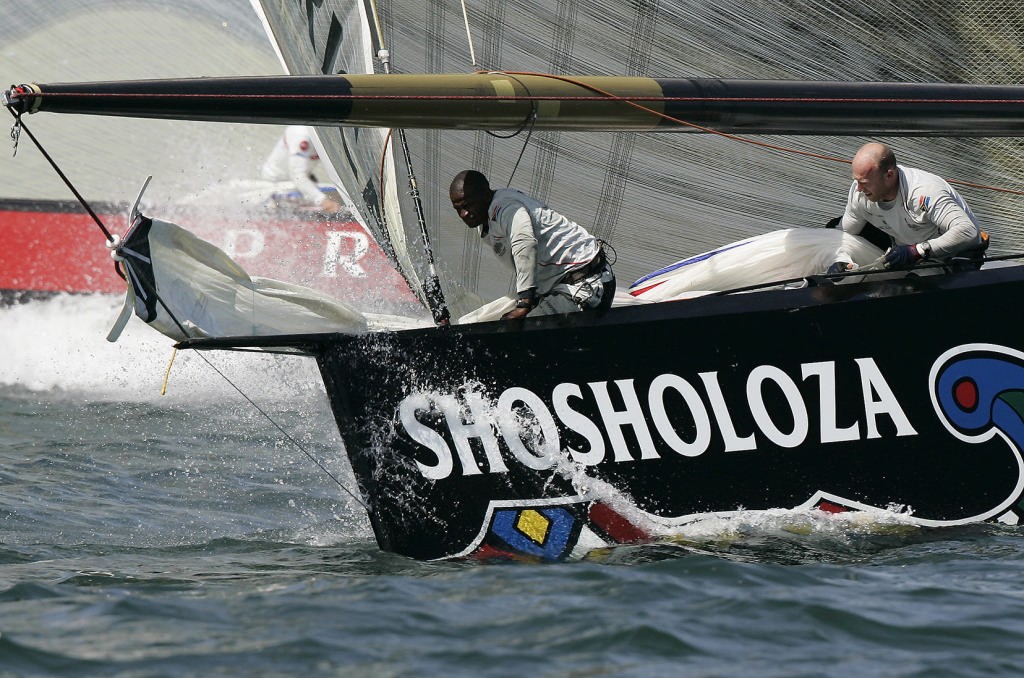 Team Shosholoza bowmen Golden Mgedeza (left) and Ken Venn - weather mark rounding in race against Luna Rossa © Peter Goldman