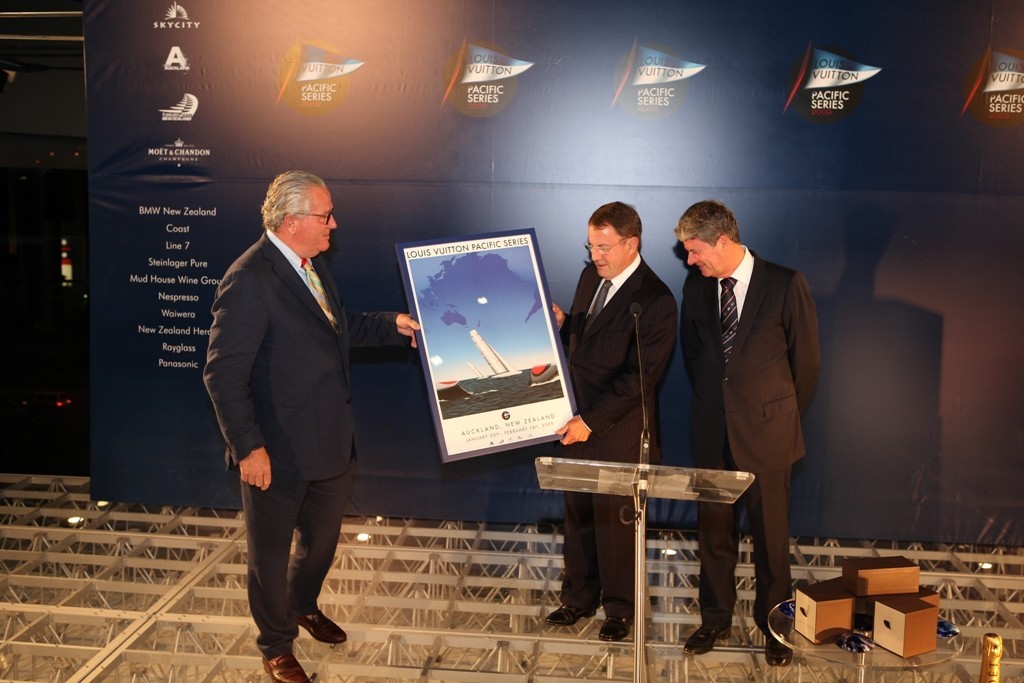 Yves carcell (right) presents a framed autographed Louis Vuitton poster to Auckland Mayor, John Banks, Photo: Luca Villata © Louis VuittonPacific Series www.louisvuitton-pacificseries.com