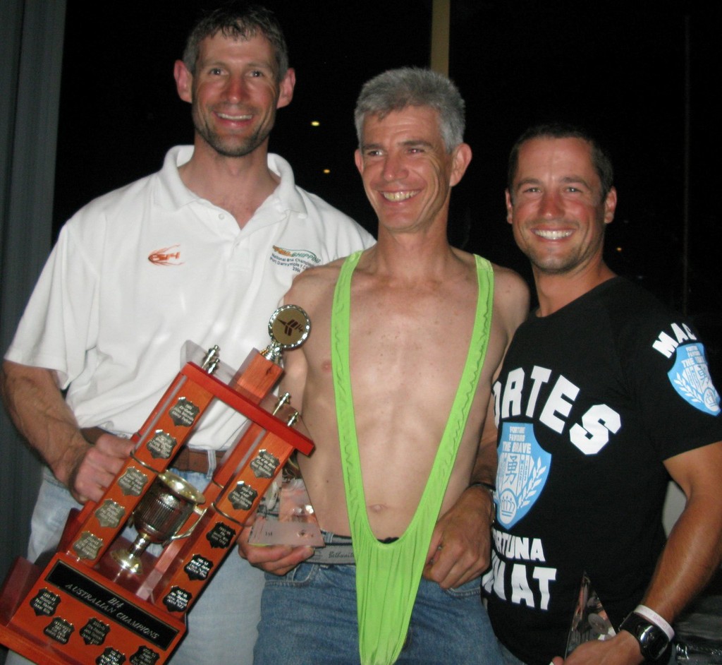 National Champions Nick Richardson and Mark Padgett receiving award from The Nude skipper Richie Reynolds, sporting mankini - Australian B14 Championships photo copyright Rafael Heale taken at  and featuring the  class