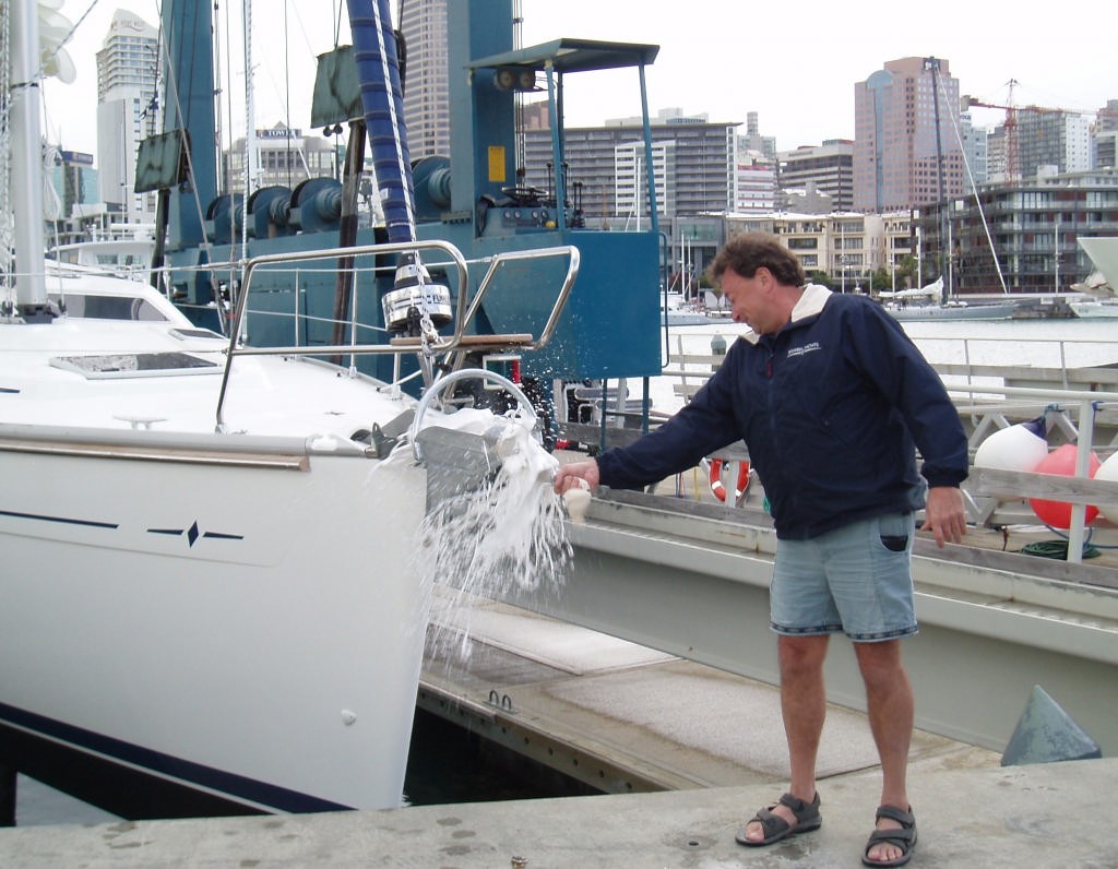 Bavaria 44 Vision ``Claymoore`` launch - Neil Stanley does the deed. photo copyright International Marine Brokers New Zealand www.internationalmarine.co.nz taken at  and featuring the  class