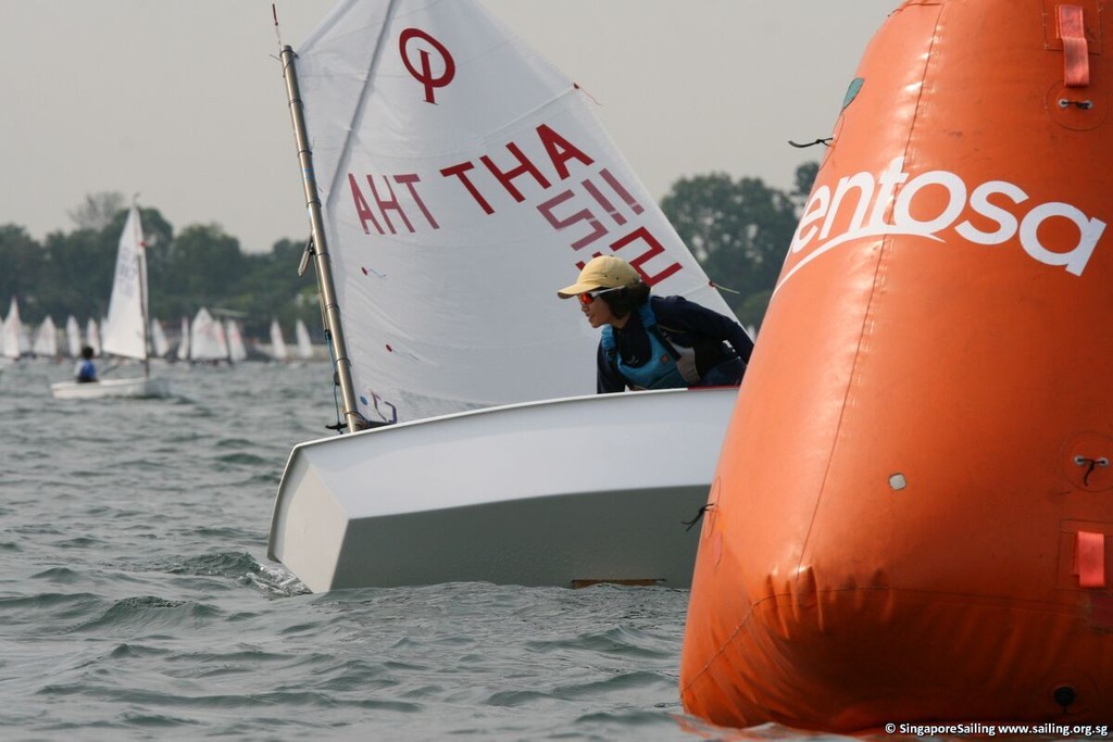 Newly crowned Sentosa Optimist Girls Champion Noppakao Poonpat (THA) © SingaporeSailing