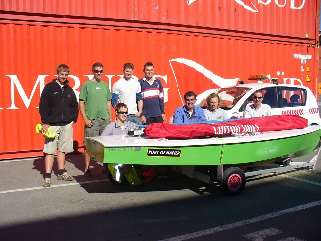 The NZ OK Worlds Team pose in front of their container. (Team photo L-R. Back Row Matt Steven (Worser Bay), Alistair Deaves, Grant Pedersen, Mark Perrow (all Wakatere). Front Row Steve McDowell, Karl Purdie (both Worser Bay, Luke O&rsquo;Connell, Trent Pryce (both Napier). photo copyright NZ OK Dinghy Assoc taken at  and featuring the  class