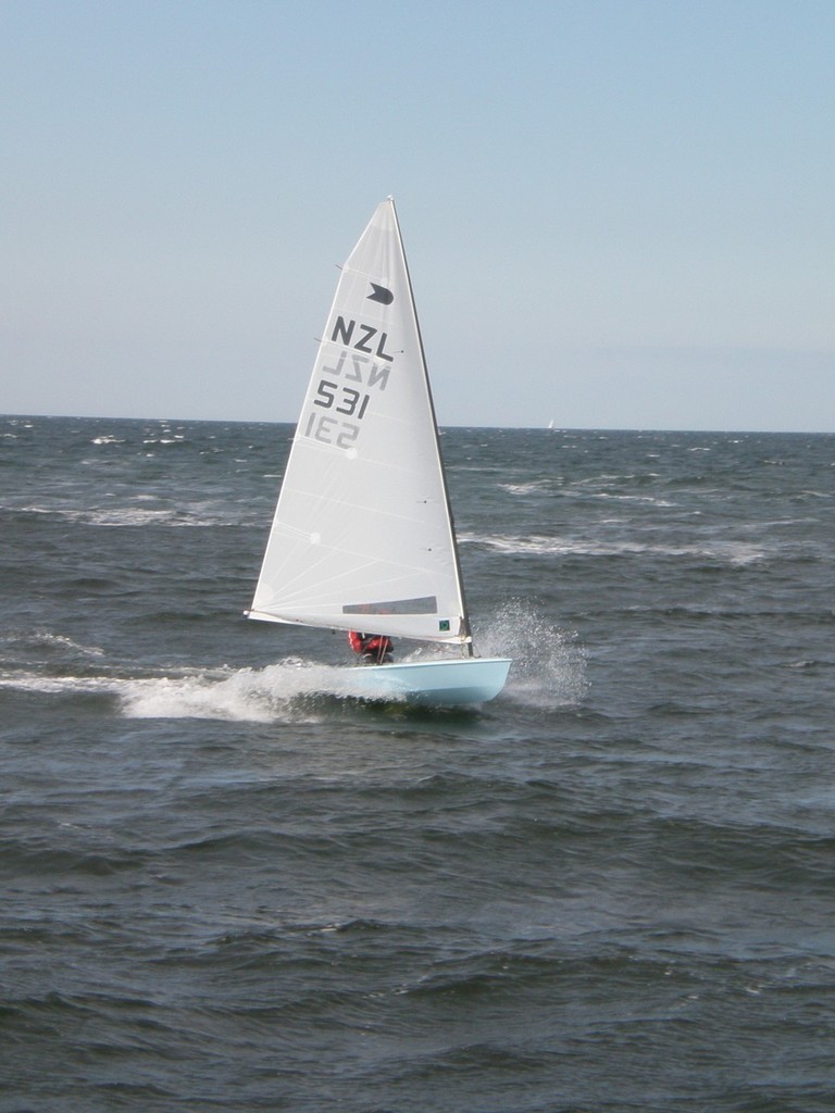 Karl Purdie sailing home from Race 3, 
OK Pre-Worlds 2008 Warnemunde, GER photo copyright NZ OK Dinghy Assoc taken at  and featuring the  class
