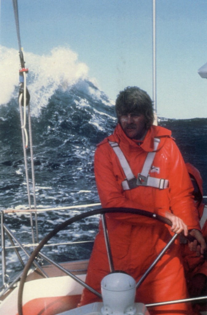 Peter Blake on the helm of Ceramco drives down a big one in the Southern Ocean returning from the Sydney Hobart Race. © Peter Montgomery