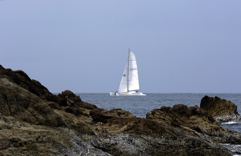 December  6  Phuket Kings Cup Regatta 2006
Phuket Thailand.
The yachts race past Ko Kaei Noi during Wednesday's Andaman Sea Race photo copyright  Rick Tomlinson http://www.rick-tomlinson.com taken at  and featuring the  class