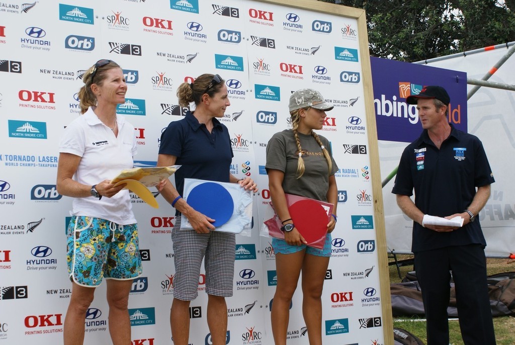 The top three womens competitors are presented with their colours this morning. From left, Barbara Kendall (NZL), Alessandra Sensini (ITA) and Blanca Manchon (ESP)  © Richard Gladwell www.photosport.co.nz