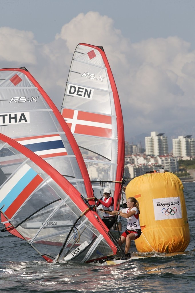 Qingdao Olympic Regatta 2008. It’s a tight squeak at every mark in the RS:X class. © Guy Nowell http://www.guynowell.com