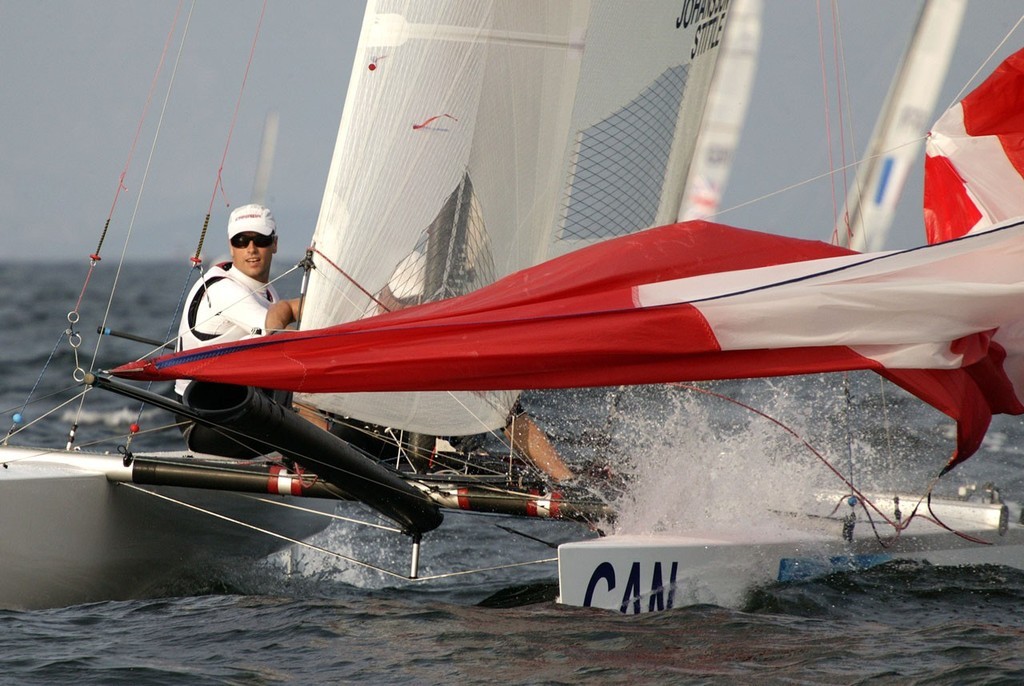Qingdao Olympic Regatta 2008. Kevin Stittle (CAN) keeps a look out.  © Guy Nowell http://www.guynowell.com