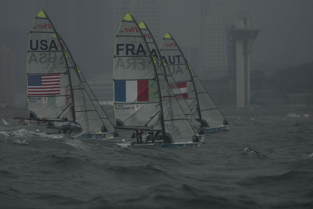 Qingdao Olympic Regatta 2008. 49er Medal Race start.  New Zealand had a light air capability as a selection criteria for its sailors - not selecting two classes for this reason. photo copyright Guy Nowell http://www.guynowell.com taken at  and featuring the  class