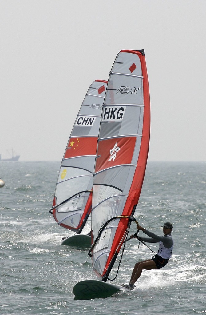 Qingdao Olympic Regatta 2008. Chan Wai Kei (HKC) coming home in front of Yin Jian (CHN).  © Guy Nowell http://www.guynowell.com