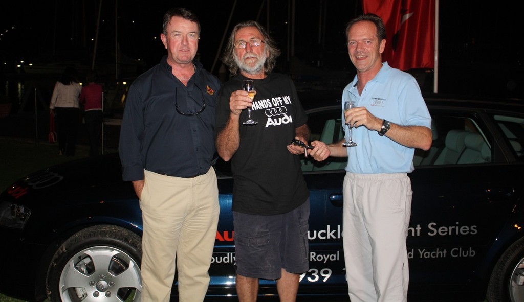 RPAYC Commodore Russell Murphy, Mick Morris winner of the Audi A3 and Bill Buckle celebrate the win in front of the Audi A3 - RPAYC Audi Bill Buckle Twilight Series photo copyright Damian Devine taken at  and featuring the  class