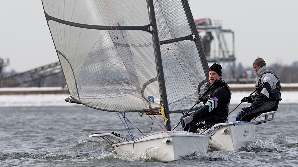 ENGLAND, London, Queen Mary Sailing Club, January 9th 2010, Bloody Mary Pursuit Race, D-One 11, Andy Rice (RYA) followed by D-One 1, Adrian Brunton, (Mengeham Rythe SC) © Ian Roman http://www.ianroman.com