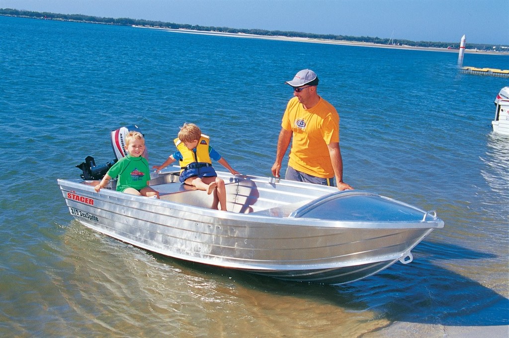 Dad and the kids enjoy quality time with a Stacer Seasprite. - Stacer - good things in small packs photo copyright Telwater Stacer taken at  and featuring the  class