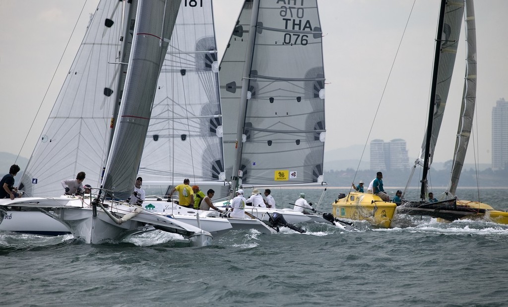 Top of the Gulf Regatta 2009, Ocean Marina Yacht Club, Pattaya, Thailand. Three Corsairs and a big banana. Multihull class at the top mark.  © Guy Nowell http://www.guynowell.com