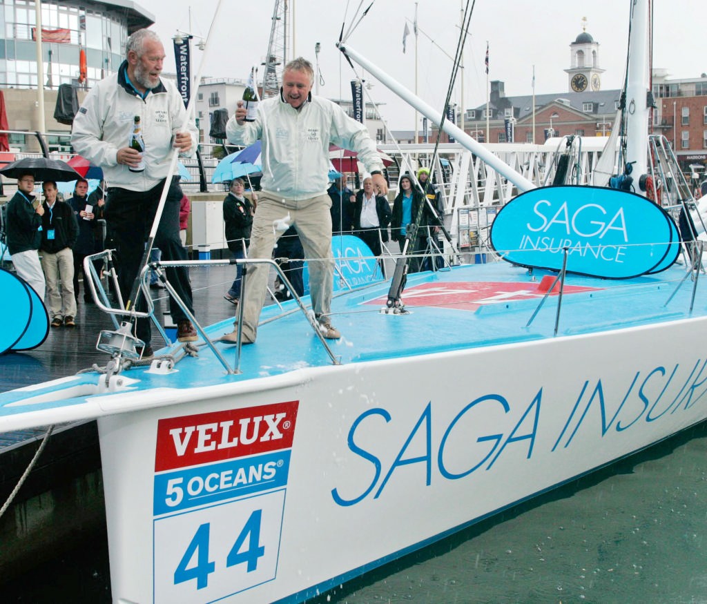 Sir Robin Knox-Johnston and rock legend, Queen drummer Roger Taylor officially name Sir Robin’s Open 60 yacht ’Saga Insurance’. © onEdition http://www.onEdition.com