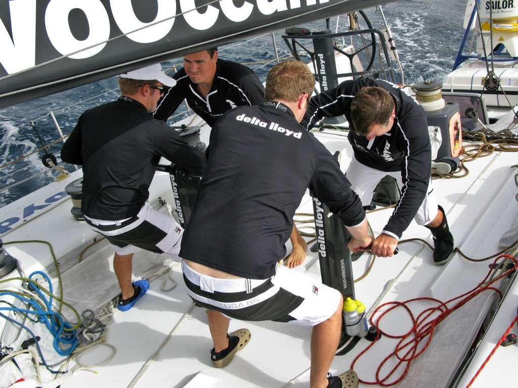  Sander Pluijm/Team Delta Lloyd: The crew of Team Delta Lloyd grinding on day 2 of leg 1 of the Volvo Ocean Race. photo copyright Volvo Ocean Race http://www.volvooceanrace.com taken at  and featuring the  class