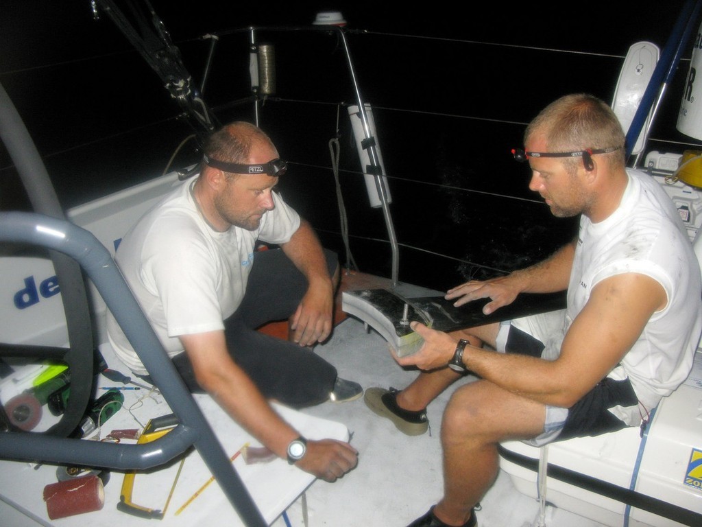 Sander Pluijm/Team Delta Lloyd.  (l-r) Martin Watts and Gerd-Jan Poortman

Team Delta Lloyd on day 9 in leg 1. The starboard spreader came down last night. Martin Watts and Gerd-Jan Poortman are trying to fix it with a smart solution.
 photo copyright Volvo Ocean Race http://www.volvooceanrace.com taken at  and featuring the  class