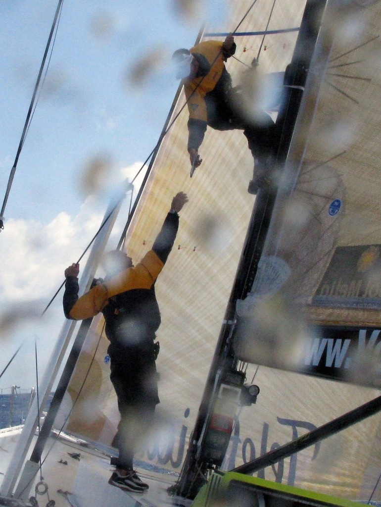 Gabriele Olivo/Equipo Telefonica/Volvo Ocean Race.<br />
Teamwork on Telefonica Blue with Bowman/Trimmer/Driver Pepe Ribes and Trimmer/Driver Xabi Fernandez performing boat maintenance. <br />
 © Volvo Ocean Race http://www.volvooceanrace.com
