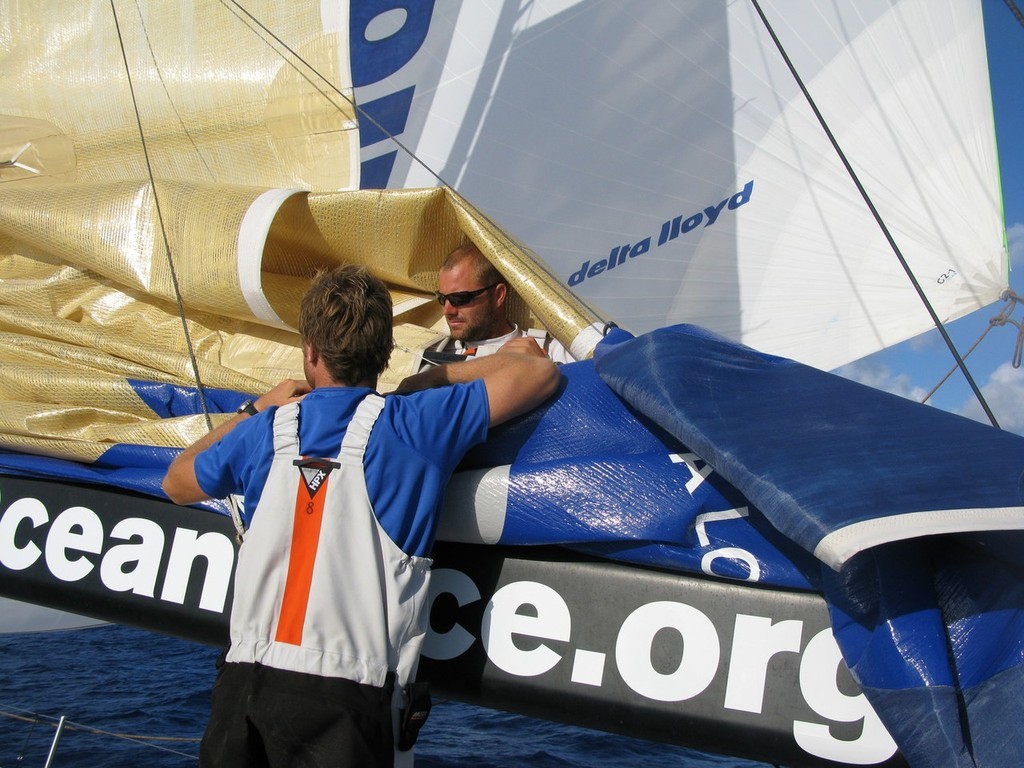 Sander Pluijm/Team Delta Lloyd/Volvo Ocean Race.
Bert Schandevyl and Gerd-Jan Poortman hard at work on Team Delta Lloyd, on leg 1 of the Volvo Ocean Race
 photo copyright Volvo Ocean Race http://www.volvooceanrace.com taken at  and featuring the  class