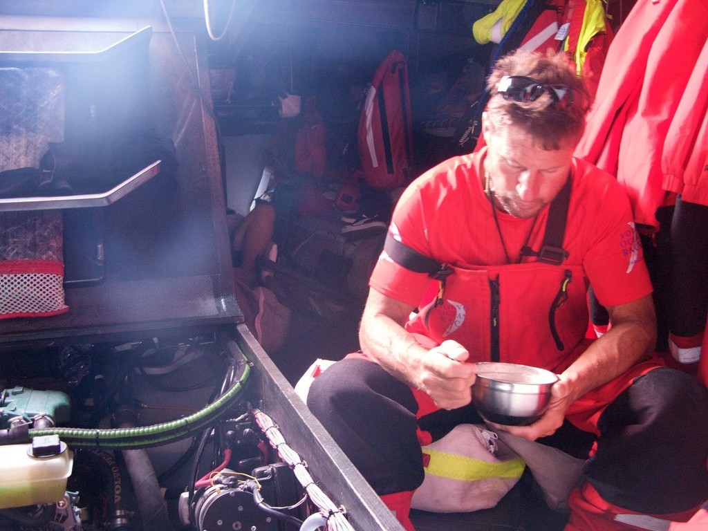 Rick Deppe/PUMA Ocean Racing: Jerry Kirby eating onboard PUMA Ocean Racing, heading towards Cape Town, on leg 1 of the Volvo Ocean Race<br />
<br />
 © Volvo Ocean Race http://www.volvooceanrace.com